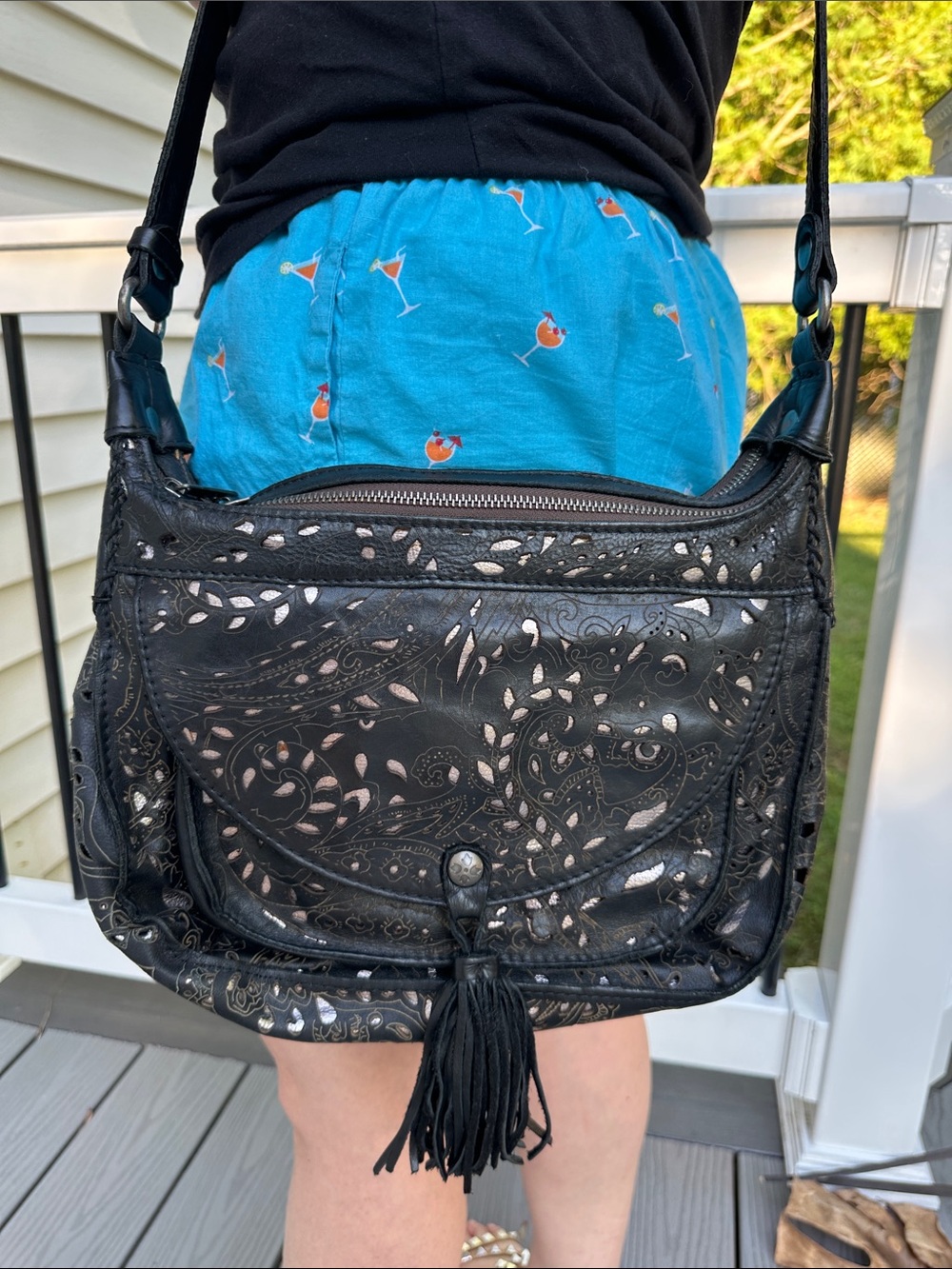 Patricia Nash Black Floral Cutout Crossbody with Tassel Accent